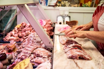 image of ribs being trimmed and prepared