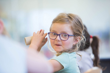 Little girl enjoying arts and crafts