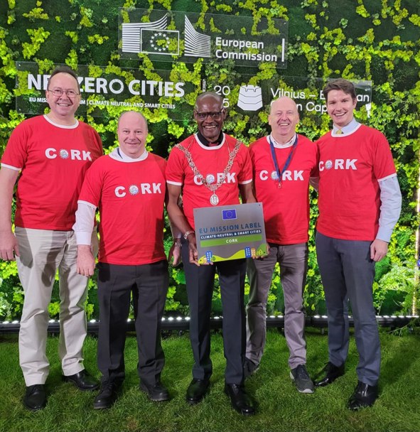 Deputy Lord Mayor Cllr. Honore Kamegni Accepting the Mission Label