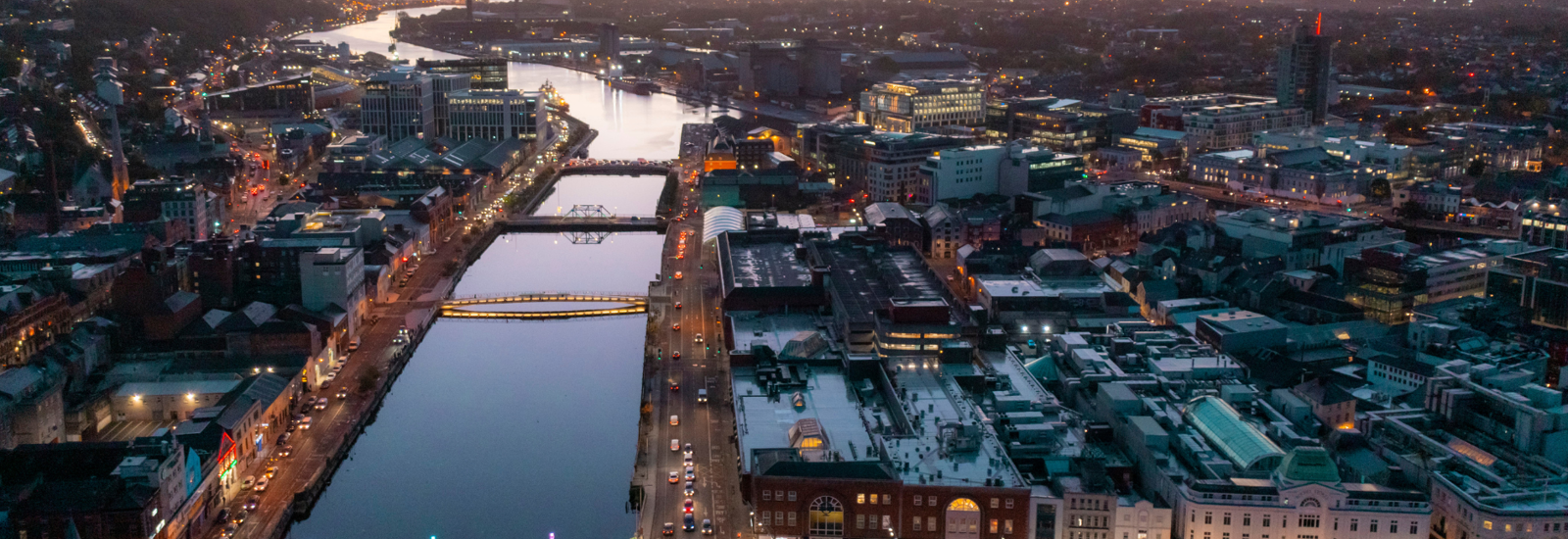 Aerial view of city at dusk