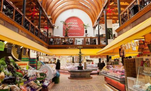 A downstairs view of the English Market with meats and veg on display at the stalls