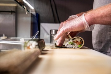 Image of sushi being prepped