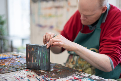 Tom O'Sullivan pictured at work in his studio at Crawford Supported Studios