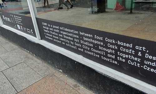 STAMP Festival Description on Building Window