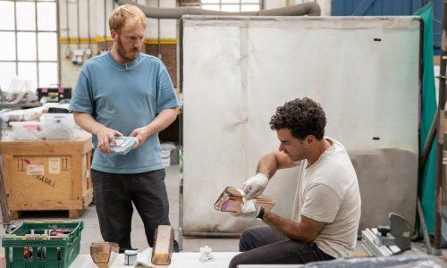 Artists working in a studio