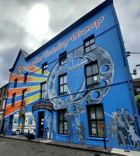 Building facade covered by mural created by Traveller Visibility Group and Cork Community Art Link