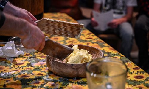 person making butter